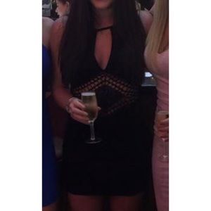 Black body-con dress with mid knit details